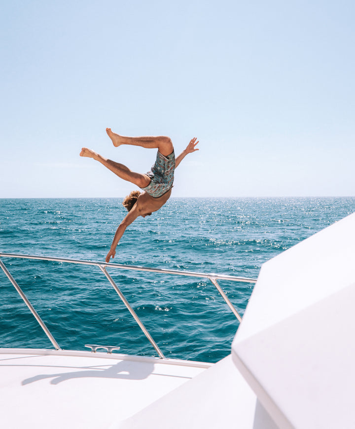 Jump over board our Catamaran and into the splashy wet. 